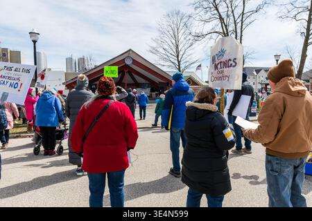 No Kings in Our Country sign at protest crowd, Ludington Michigan, 28 March 2026. Jeffrey Wickett/Alamy Live News