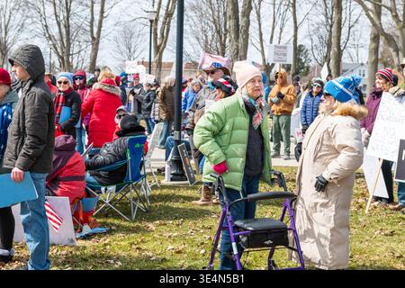 Elderly woman with walker at No Kings protest, Ludington Michigan, 28 March 2026. Jeffrey Wickett/Alamy Live News