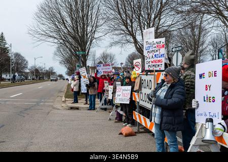 Long line of protesters along Lewis Avenue, Ludington Michigan, 28 March 2026. Jeffrey Wickett/Alamy Live News