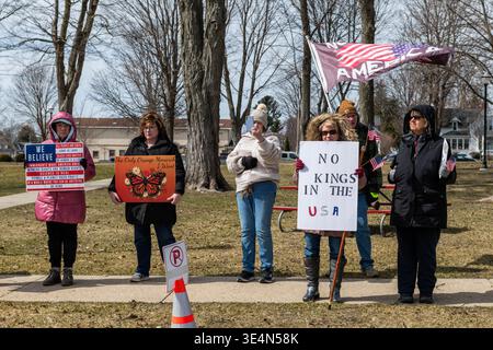 No Kings in the USA sign held by demonstrators at protest, Ludington Michigan, 28 March 2026. Jeffrey Wickett/Alamy Live News